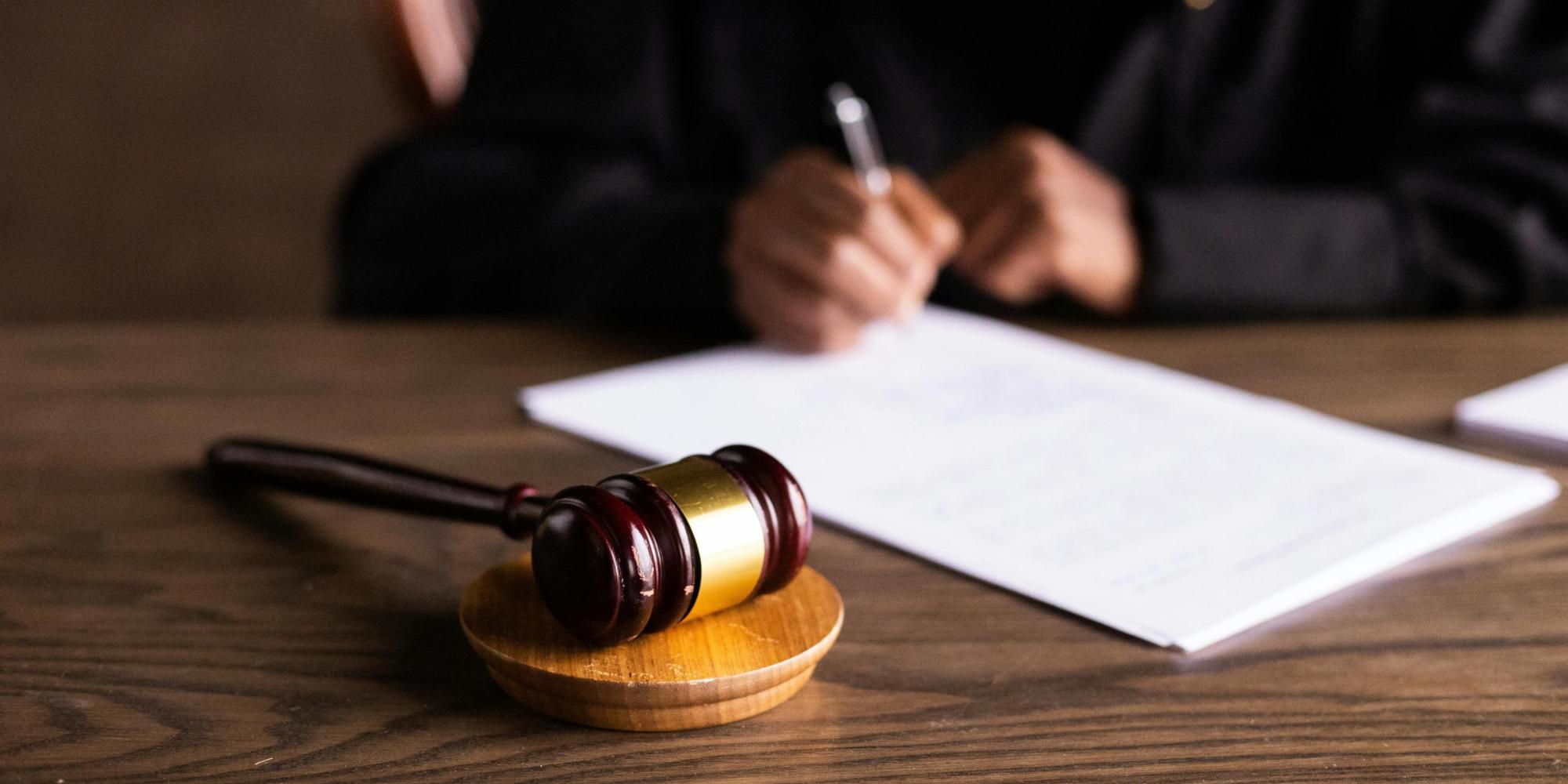 Gavel and Signing Documents Image